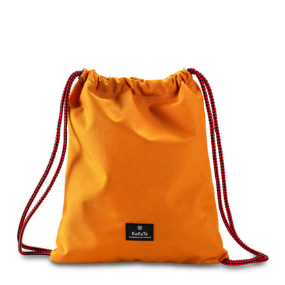 Gymbag «1Täger» Safrangelb von KoKoTé, der Urner Taschenmanufaktur. Swiss made Taschen und Accessoires.