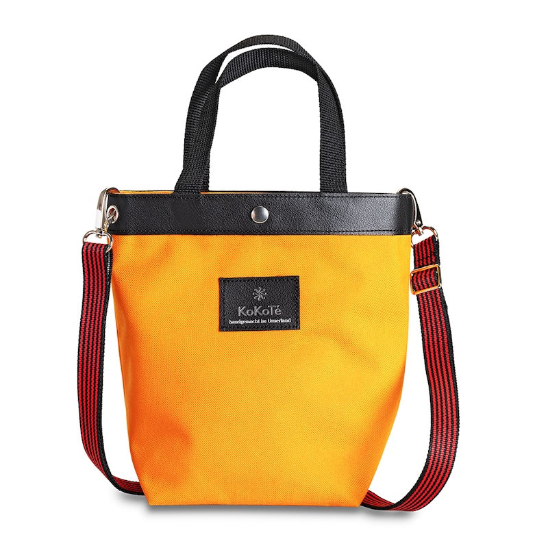 Einkaufstasche «Poschti S» Safrangelb von KoKoTé, der Urner Taschenmanufaktur. Swiss made Taschen und Accessoires.